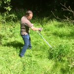 Donald Albrecht cutting the Glade’s grass.