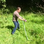 Donald Albrecht cutting the Glade’s grass.