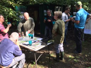 Volunteers enjoying a mid morning coffee break